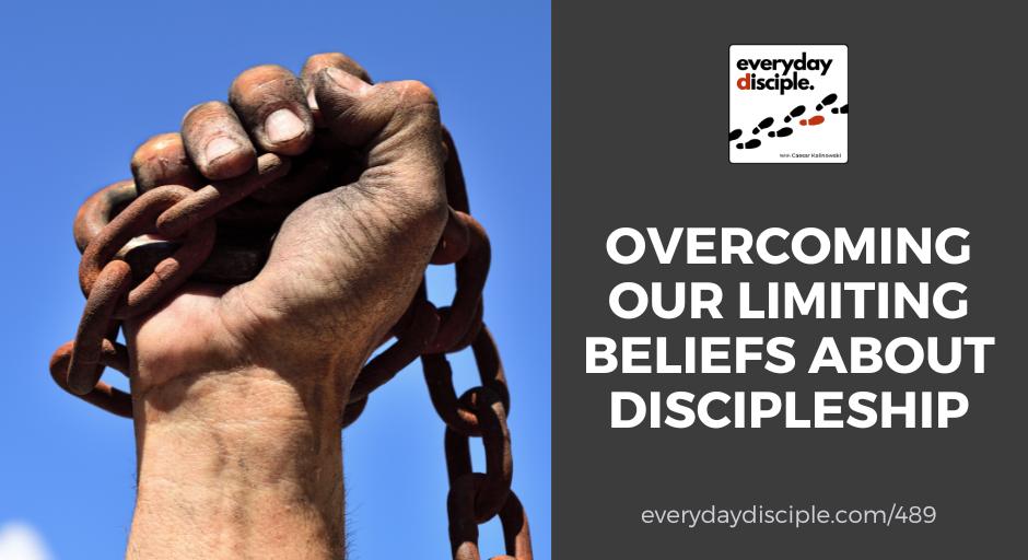 Hand holding old rusty chains held triumphantly in the air in victory representing overcoming limiting beliefs about disciple-making.