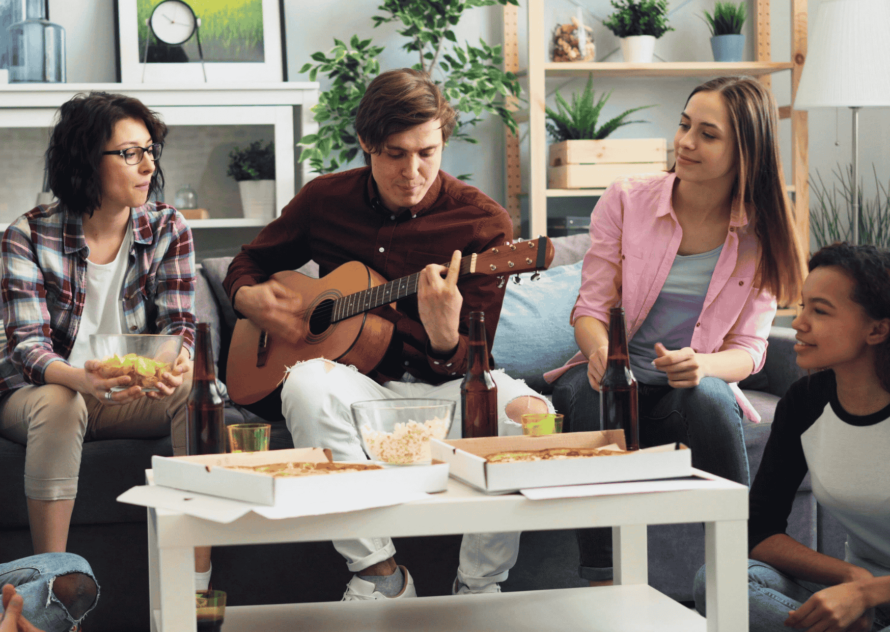 A close-knit group of friends around a dinner table discussing life on mission
