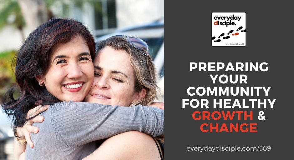 Two women share a joyful hug symbolizing care and transformation within a faith community.