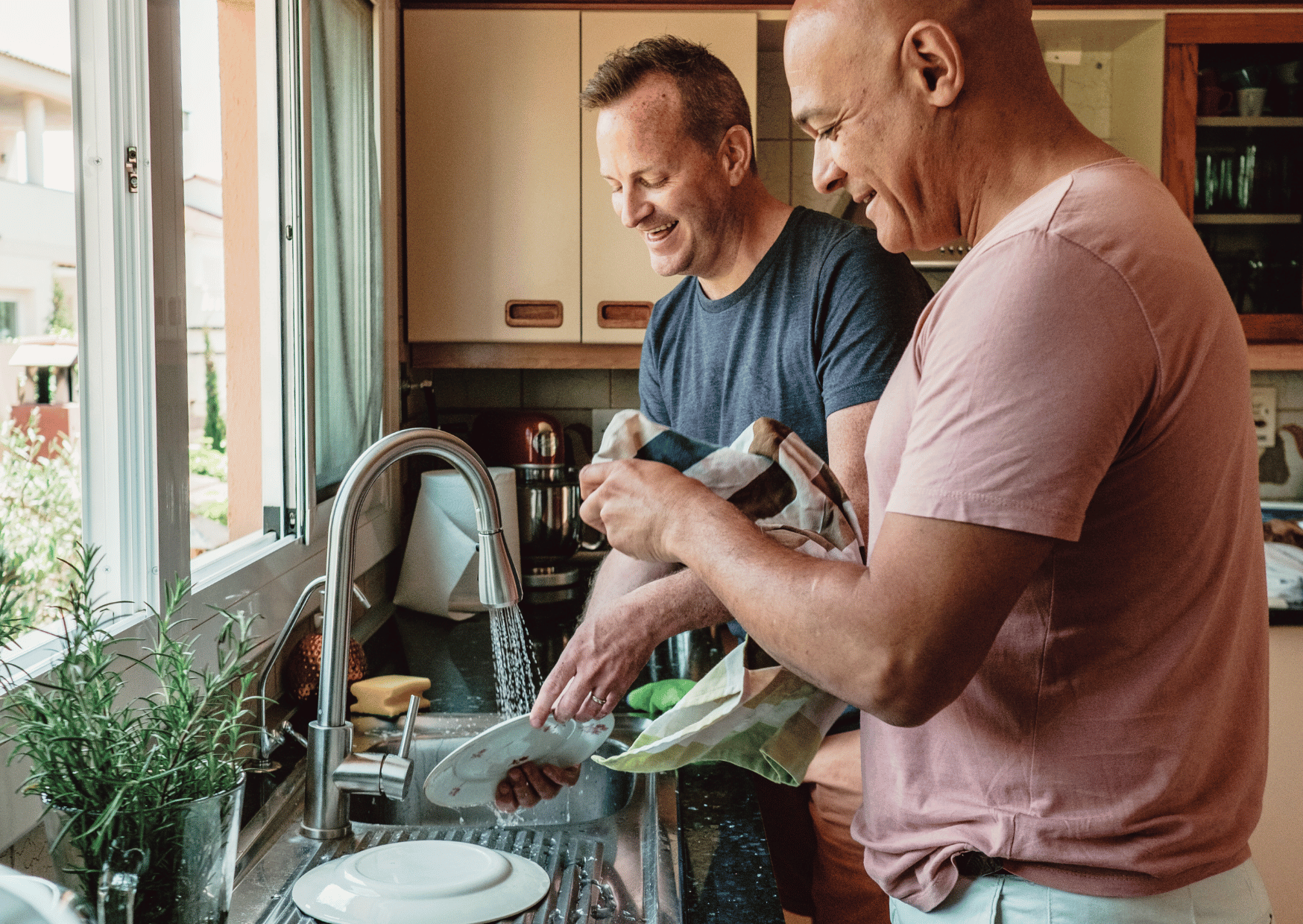 family helping wash dishes after dinner night
